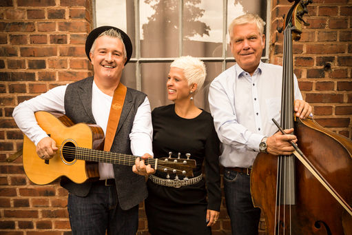Gruppenfoto der Bandmitglieder
