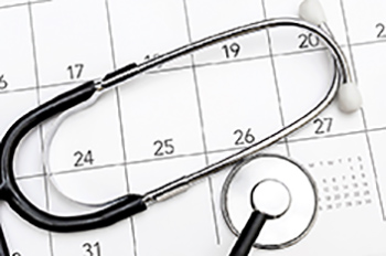 Kalender und Stetoskop. Schmuckbild